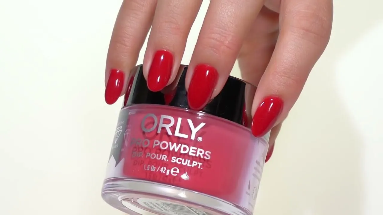 Showcasing manicure product with red nails